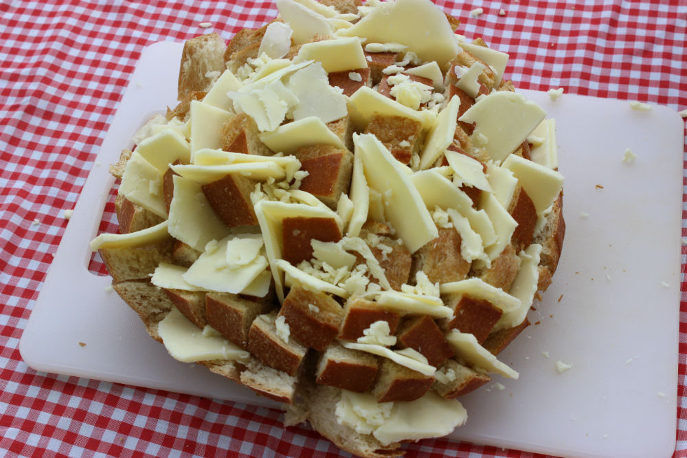 Cheese Stuffed into Bloomin' Onion Dutch Oven Bread